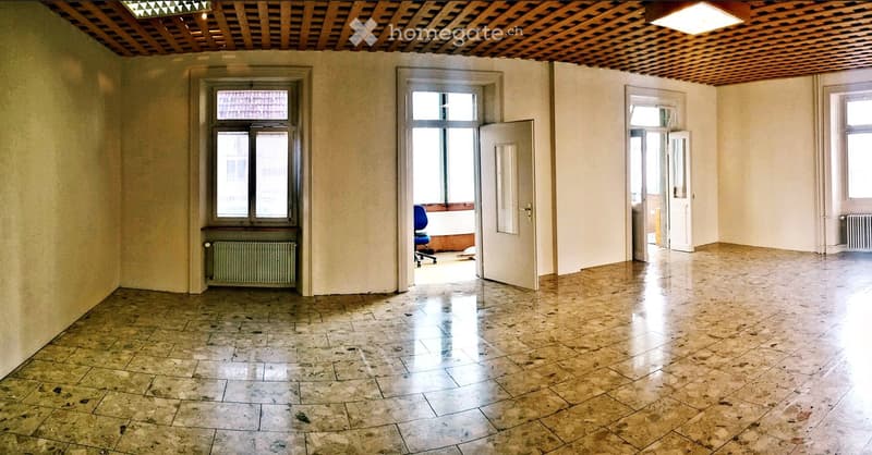 empty room, tiled floor, white walls, wooden ceiling, windows, radiators