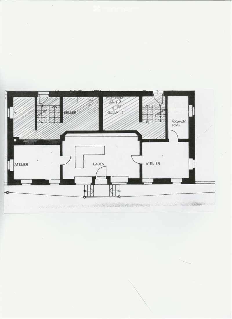 Floor plan showing a multi-level building with labeled areas including two cellars, two ateliers, a shop area, and a technical room.