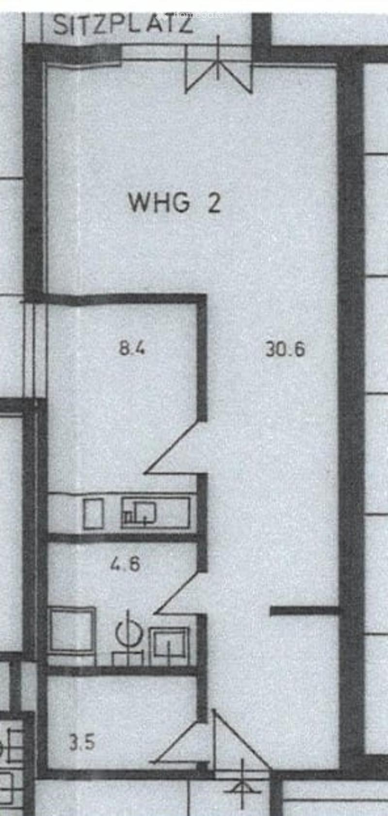 Floor plan of apartment 2 showing a living area, kitchen, and bathroom with dimensions labeled.