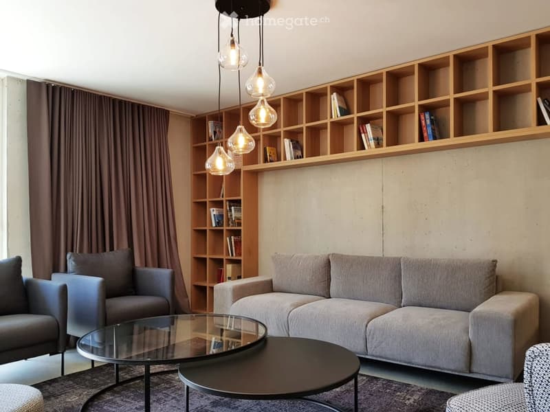 Espaces communautaires : salon et bibliothèque