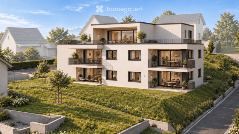 Modern two-story house with white exterior, large windows, balconies, and a raised ground floor. The house is surrounded by a well-maintained lawn and trees.