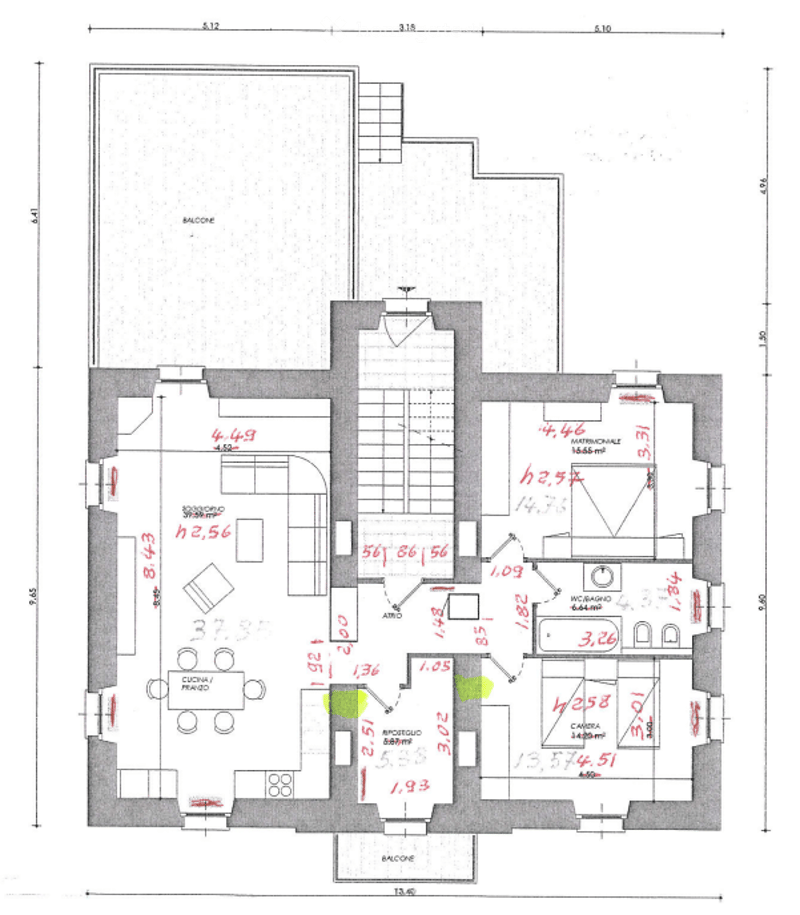 Floor plan of a residential building showing multiple rooms including living area, bedrooms, bathrooms, and balconies.