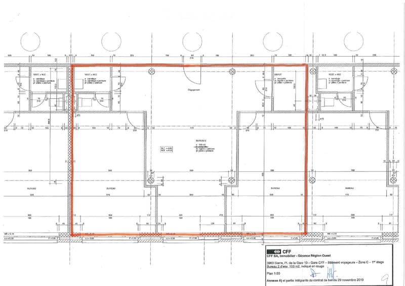 Floor plan of a building showing multiple rooms including offices, bathrooms, and a storage area. Dimensions and room labels are indicated, with Bureau 2 highlighted in red.