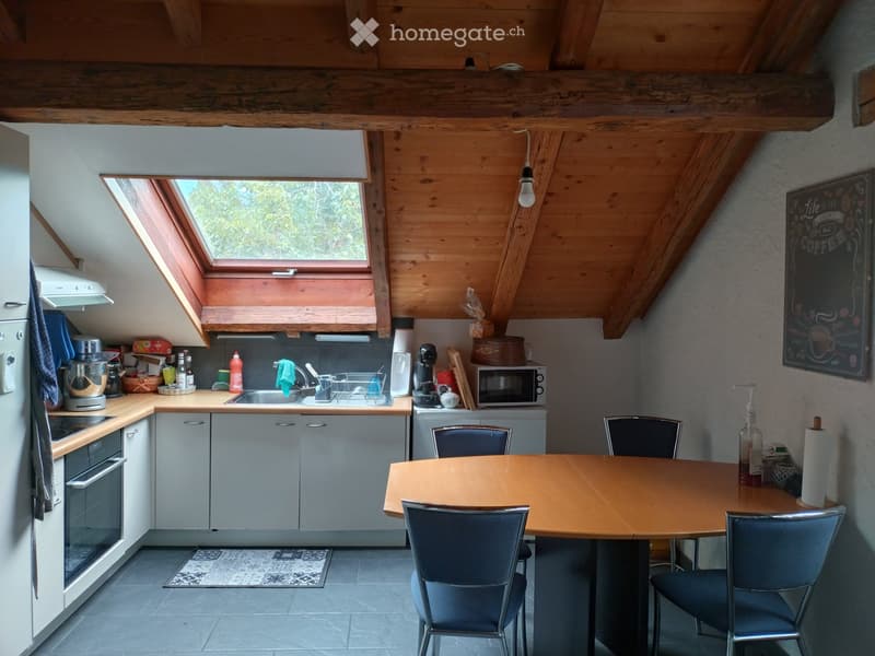 {"type": "Kitchen", "objects": ["refrigerator", "oven", "microwave", "sink", "faucet", "dish rack", "table", "chair", "blender", "cupboard", "bottle", "towel", "oven mitt", "cup", "bottle of water", "cupboard", "oven", "oven mitt", "cupboard", "cupboard",
