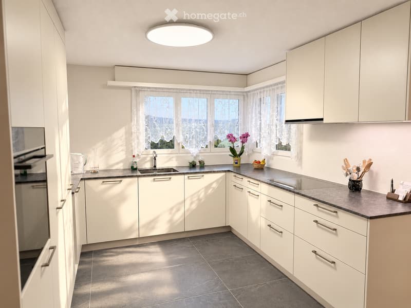 Modern kitchen with white cabinets, stainless steel appliances, and a grey countertop. Features include a sink, oven, and various kitchen items such as a vase with flowers, a bowl of fruit, and utensils.