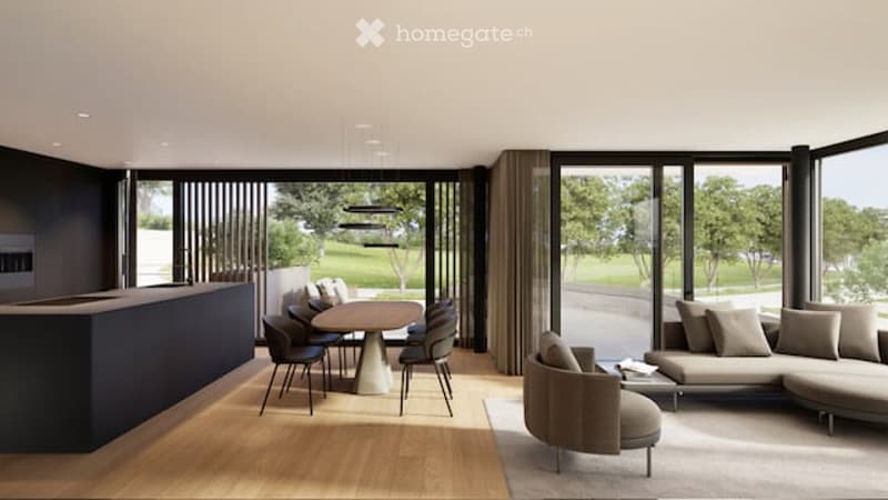 Open-plan living and dining area with large windows offering a view of the outdoors, featuring a modern sofa, ottoman, coffee table, dining table, and chairs.