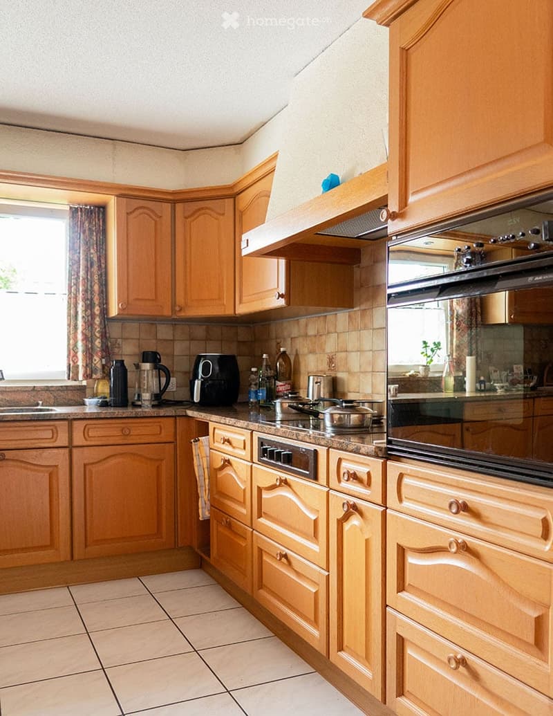 {"type": "Kitchen", "objects": ["cabinets", "oven", "fridge", "coffee maker", "sink", "cupboard", "oven hood", "bottle", "cup", "faucet", "oven", "oven", "oven", "oven", "oven", "oven", "oven", "oven", "oven", "oven", "oven", "oven", "oven", "oven", "oven