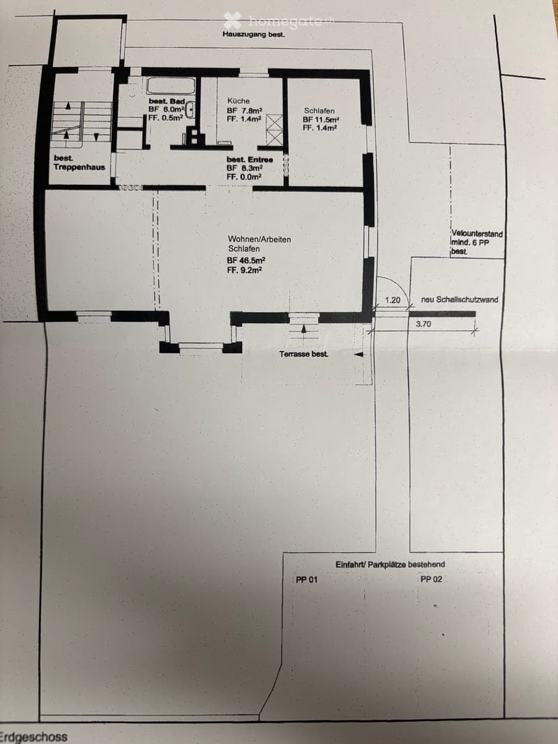 Floor plan of a house showing living/work space, bedroom, kitchen, bathroom, entrance, staircase, terrace, and parking spaces.