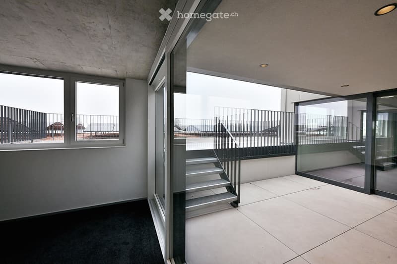 tiled floor, glass wall, balcony, staircase, metal railing, large windows
