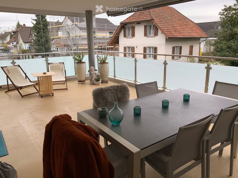 {"visible_features": ["Balcony / Terrace"], "type": "Balcony / Terrace", "objects": ["table", "chair", "cup", "vase", "furry throw", "table", "chair", "cup", "cup", "cup", "cup", "cup", "cup", "cup", "cup", "cup", "cup", "cup", "cup", "cup", "cup", "cup",