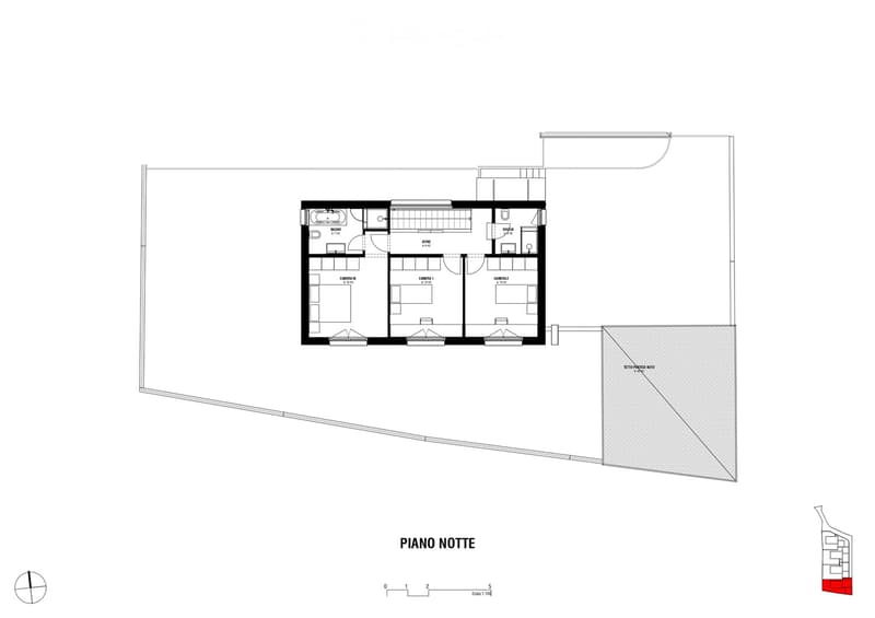 Floor plan of a residential unit labeled "Piano Notte" (Night Floor), featuring three bedrooms, a bathroom, a living area, and a parking space.