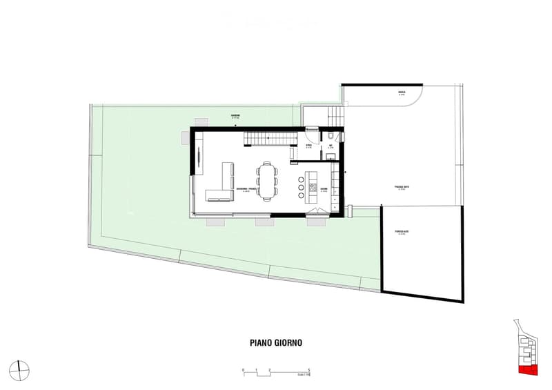 Floor plan of a ground floor showing a living area, dining area, kitchen, bathroom, and garage.