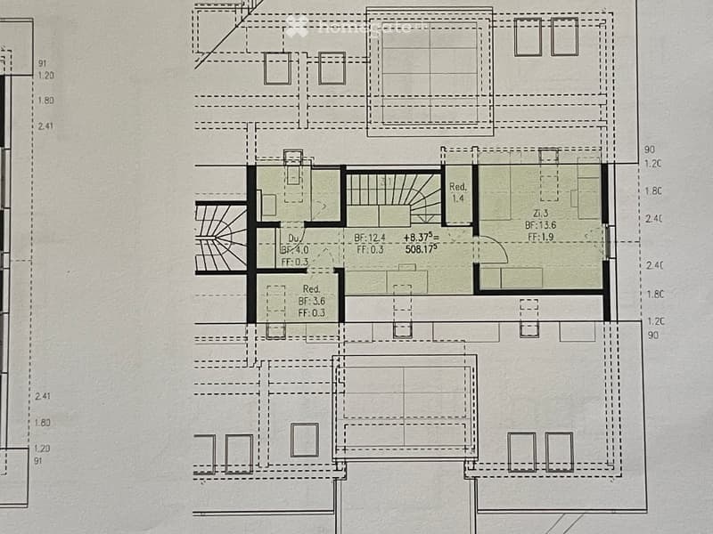 Floor plan of a multi-level building with labeled rooms and dimensions, including living areas, bedrooms, and bathrooms.