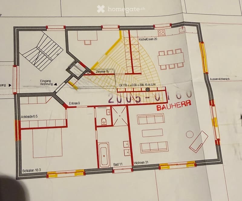 Floor plan of a residential space showing multiple rooms including a kitchen, living area, bedroom, and bathroom.