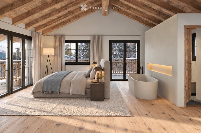 Spacious bedroom with wooden floors, exposed wooden beams, large windows with mountain views, a modern bed, nightstand, bathtub, and floor lamp.