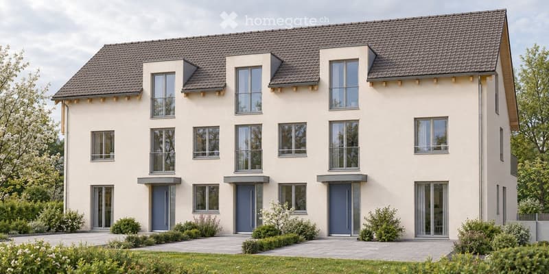 Modern two-story house with light beige exterior, multiple windows, grey doors, and a well-maintained garden.