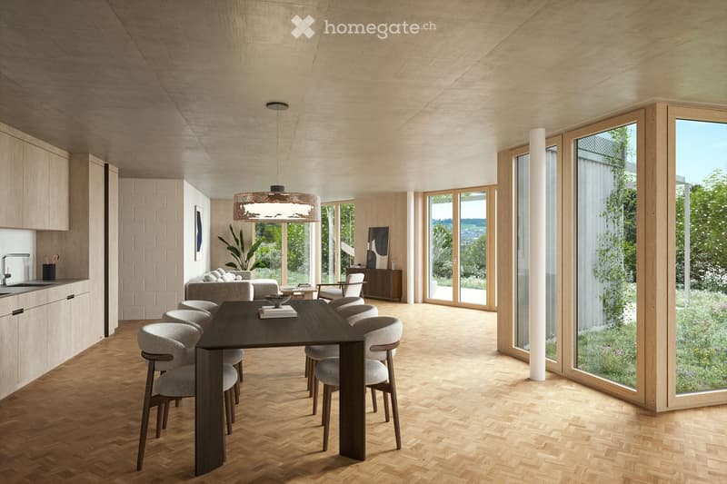 Open-plan living and dining area with wooden flooring, large windows, modern furniture including a dining table with chairs, a sofa, kitchen cabinets, and a pendant light.