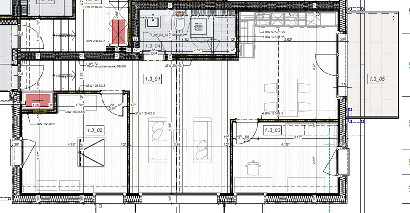 Floor plan of a residential building showing multiple rooms including living areas, bedrooms, bathrooms, and a kitchen. Dimensions and room labels are indicated.