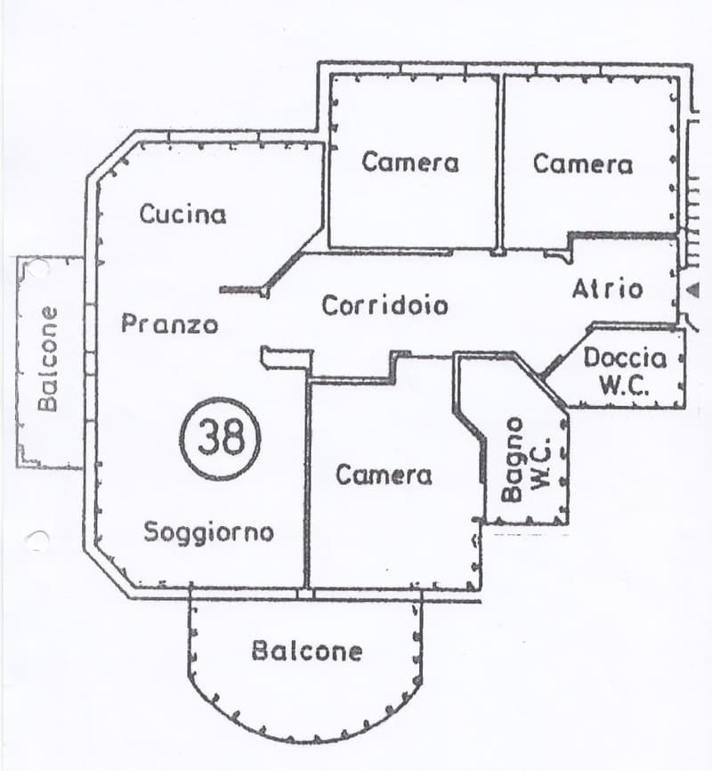 Floor plan with living room, kitchen, 3 bedrooms, 2 bathrooms, balcony, and a bathroom with a WC.