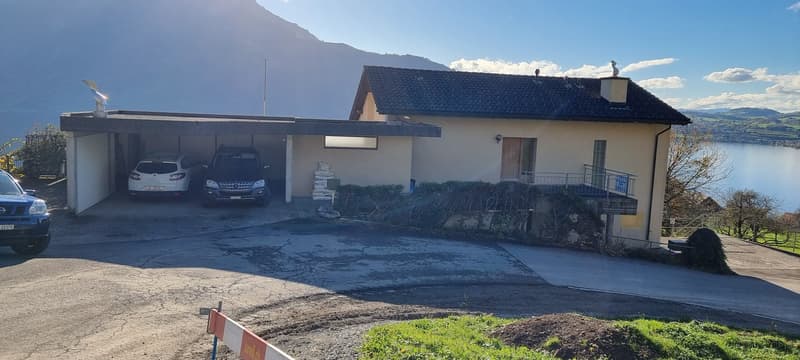 detached house with garage, lakeside view