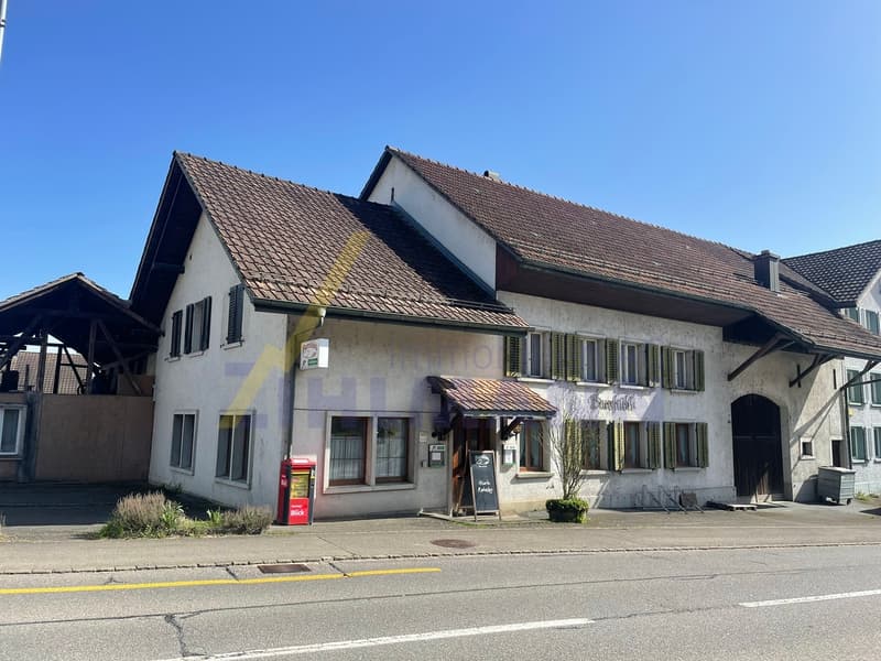 Wohnhaus mit Restaurant und Schopf