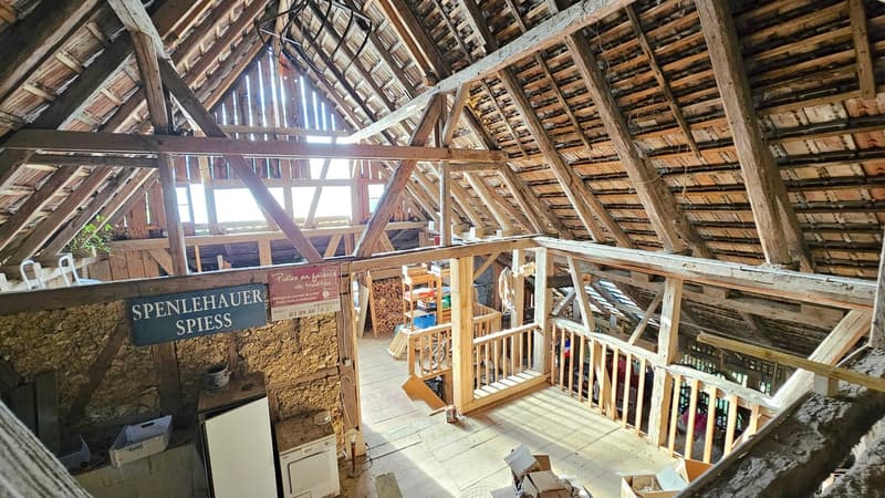 Old barn interior, wooden beams, attic, shelves, wooden floor