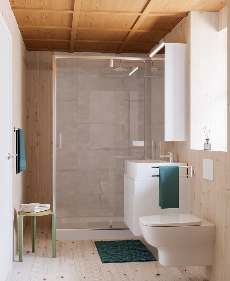 Modern bathroom with white walls, tiled floor, wooden ceiling, glass shower, vanity, white toilet, green rug
