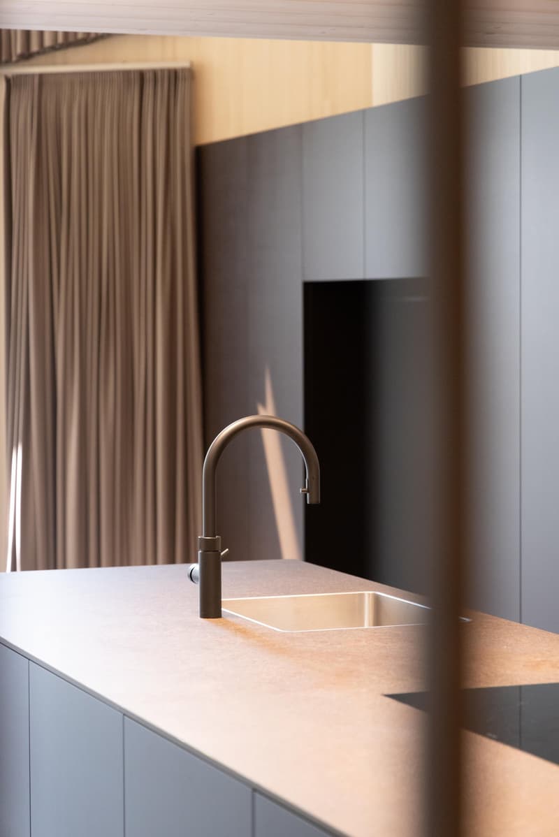 modern kitchen with stainless steel sink, faucet, and countertop