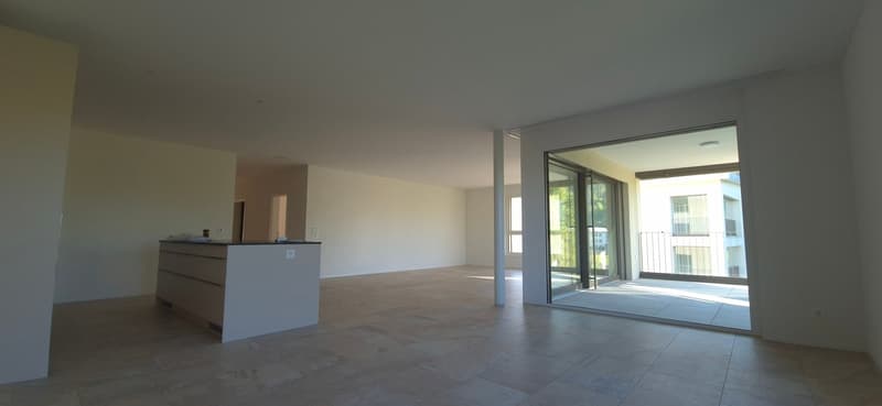 empty room, tiled floor, sliding glass doors, balcony, kitchen counter