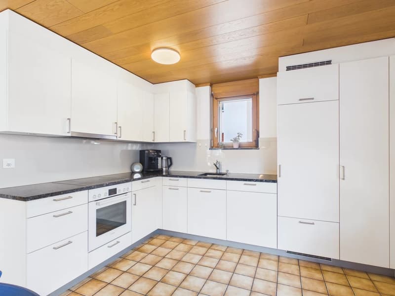 modern kitchen, white cabinets, wooden ceiling, tiled floor, electric stove, dishwasher, sink, window