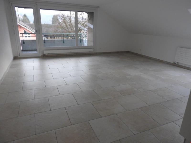 empty room, white walls, tiled floor, sliding glass doors, balcony