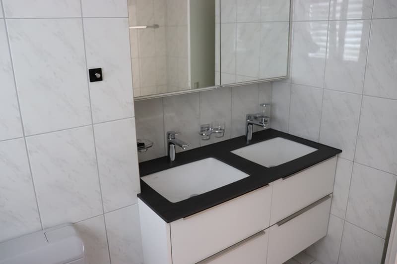 Moderne Eleganz: Stilvolle Wohnung mit grosszügigem Aussenbereich! (13)