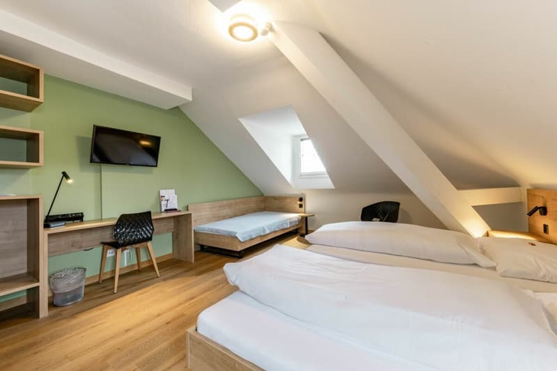 Ein Familienzimmer im Seelandhotel Weisses Kreuz in Lyss