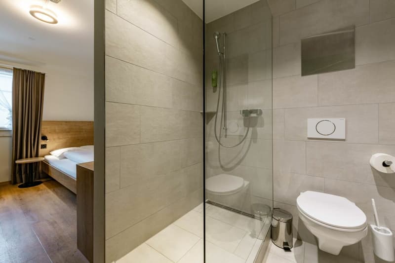 Ein Badezimmer im Seelandhotel Weisses Kreuz in Lyss