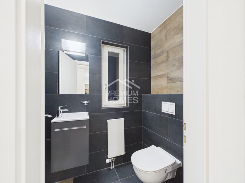 Le confort d'un appartement rénové à Bevaix (6)