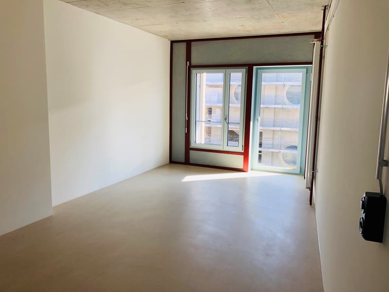 3.5-Zi.Whg._14_1.1_Zimmer Hofseite.jpg