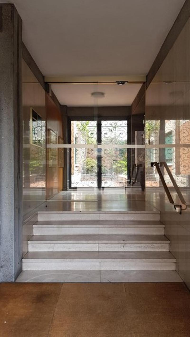 staircase, marble flooring, glass railing, glass doors, tiled hall