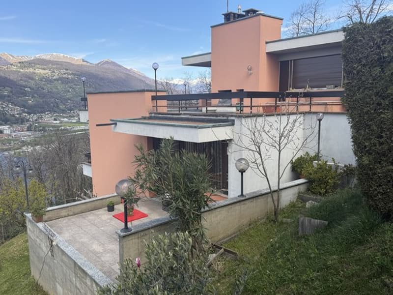 modern house, pink and white exterior, balcony, terrace, mountain view