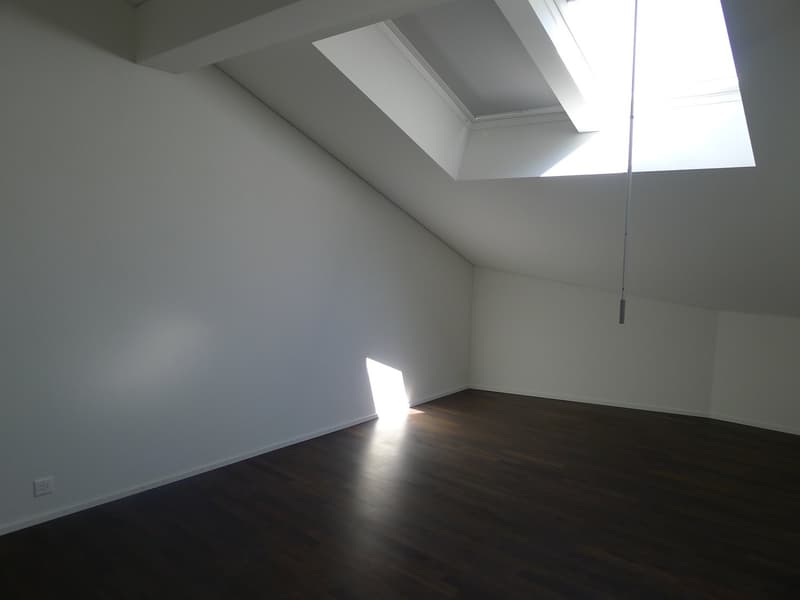 Schlafzimmer mit Dachfenster