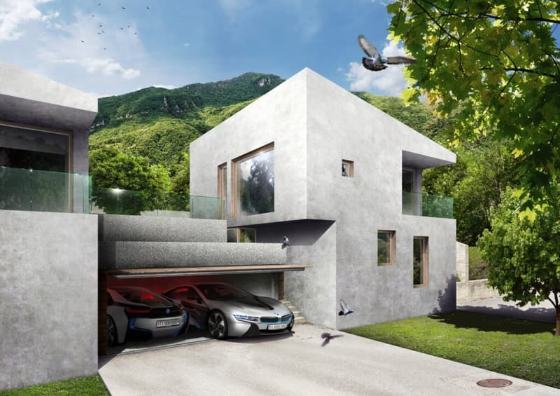 Modern architecture, concrete construction, 2 story garage, elevated ground floor, multiple windows, trees, mountains