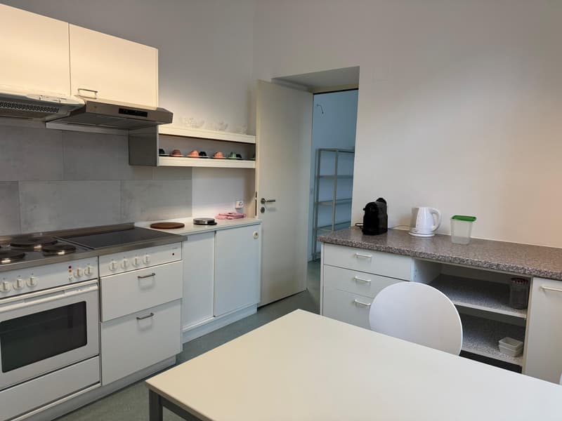 modern kitchen, white cabinets, granite countertops, gas stove, oven, dishwasher, sink, appliances
