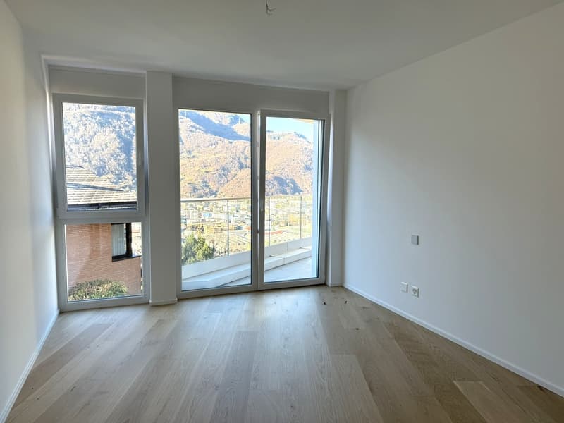 wooden floor, white walls, large windows, sliding doors, terrace, power outlets