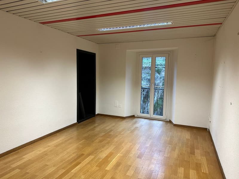 empty room, wooden floor, white walls, sliding glass door, balcony