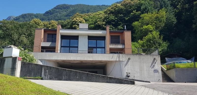 modern house, brick and glass, 2 floors, balcony, underground parking
