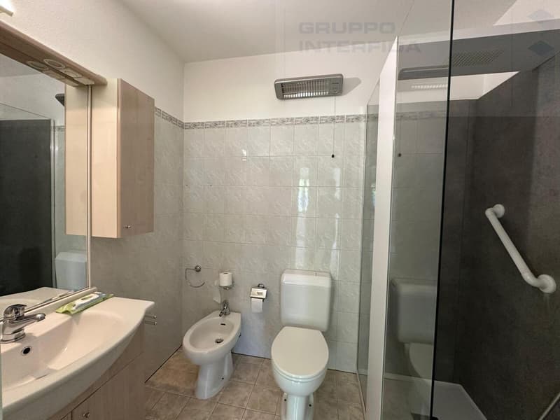 4.5 LOCALI CON GIARDINO E PISCINA CONDOMINIALE (13)