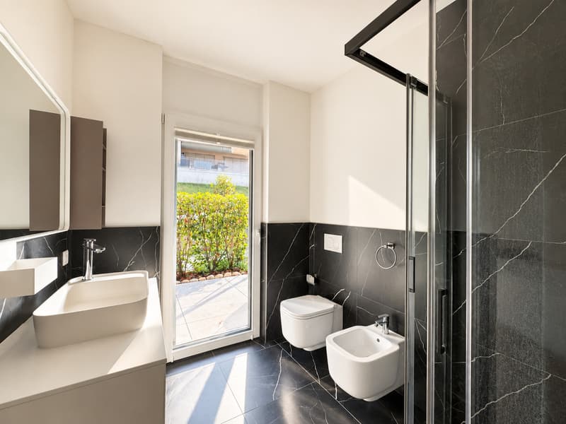 APPARTAMENTO 4.5 LOCALI CON AMPIO GIARDINO (8)