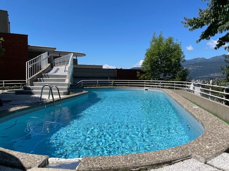 Spazioso appartamento di 2.5 locali con piscina  e vista panoramica a Ruvigliana (2)
