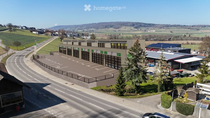 Industrial complex building, parking lots in front, glass windows, nearby road, greenery