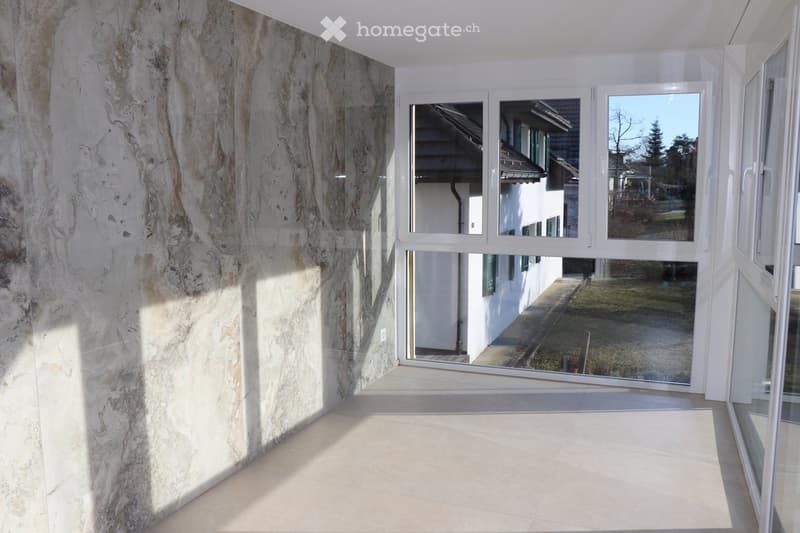 marble wall, tiled floor, large glass windows, exterior view