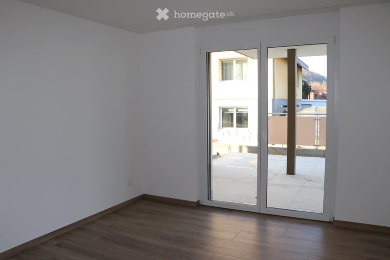 empty room, white walls, wooden floor, sliding glass door, balcony outside
